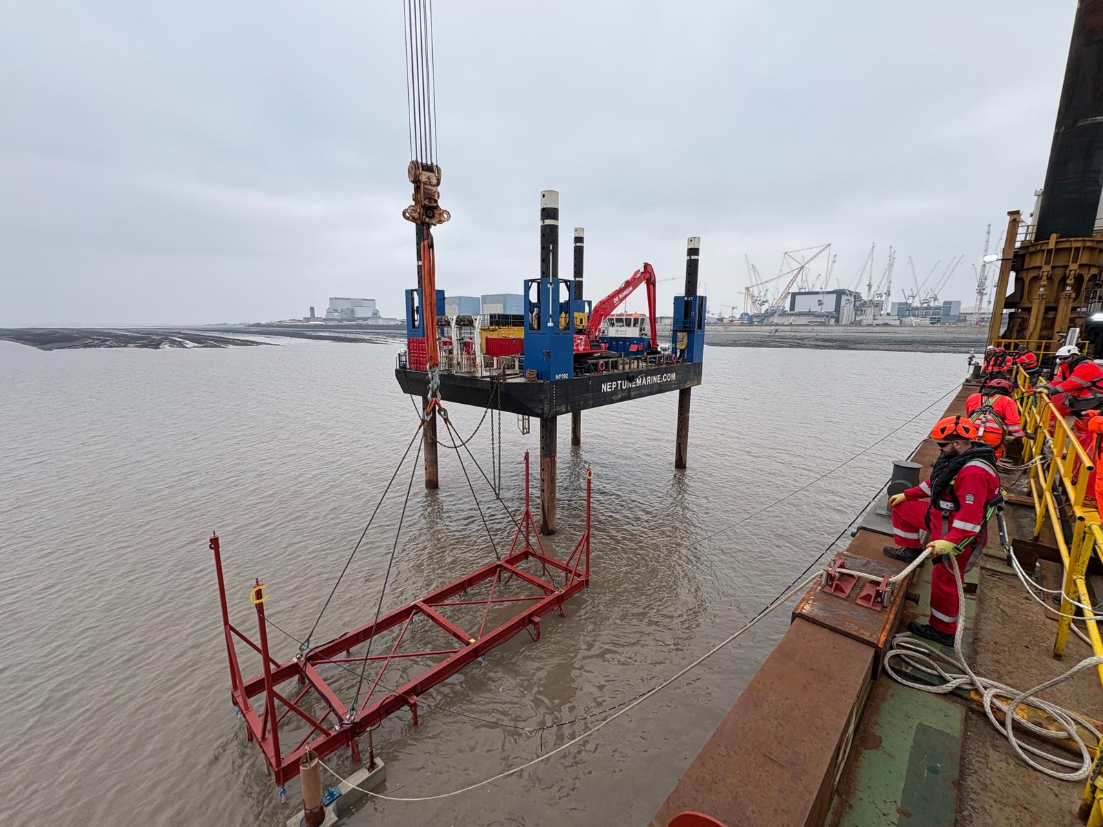 Evans Marine offshore heavy lifting team on a jack-up barge with crane during a marine lift